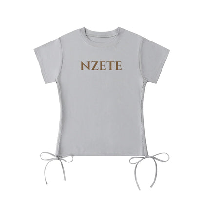 Light grey athletic t-shirt with side drawstrings and bold NZETE text on chest